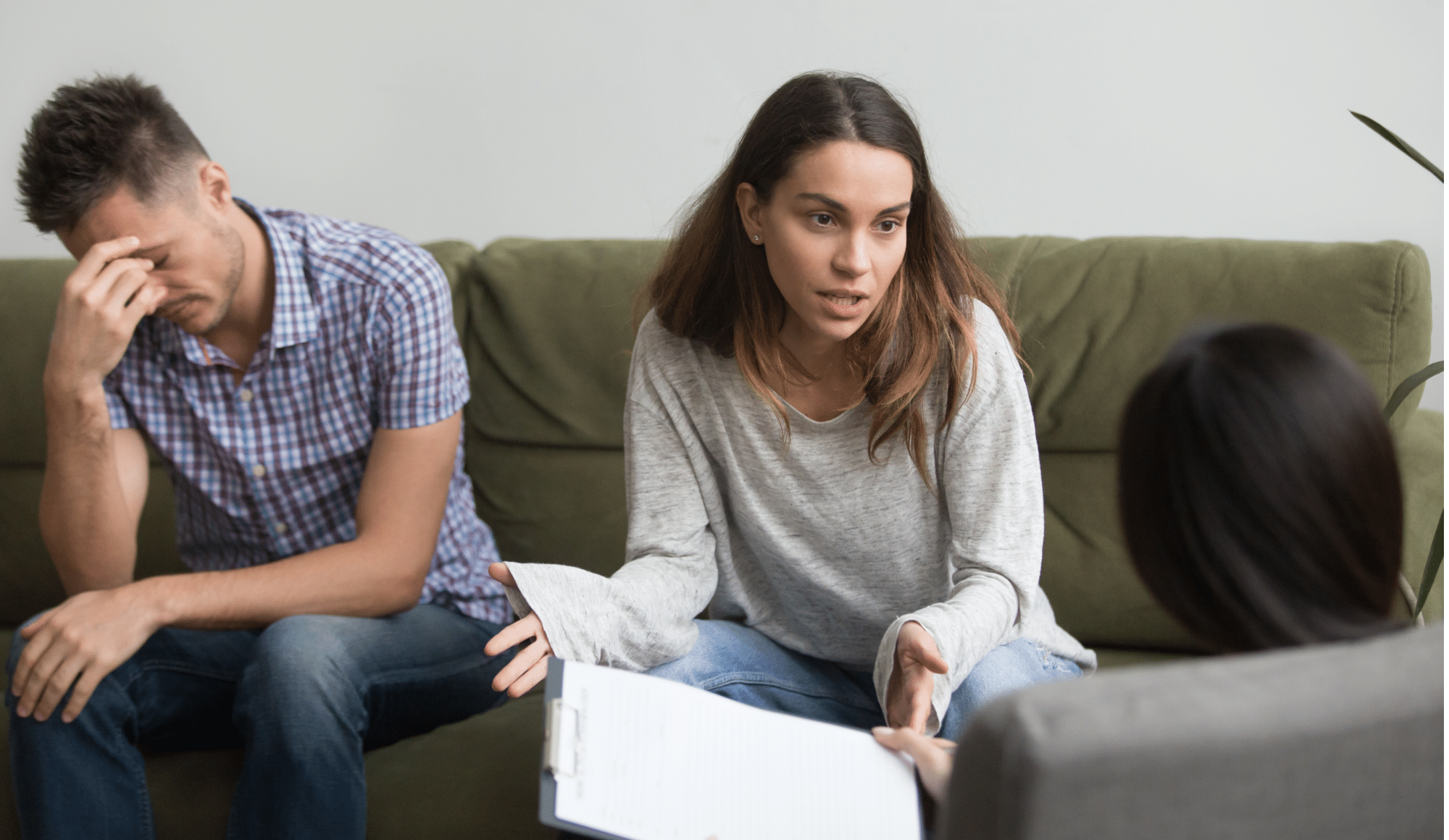 How to Find Safe Heroin Detox Centers - Pathfinders Recovery Center - A wife and her husband sit in family counseling at an inpatient rehab after her husband finished detox at a safe heroin detox center to discuss his progress and downfalls in treatment.