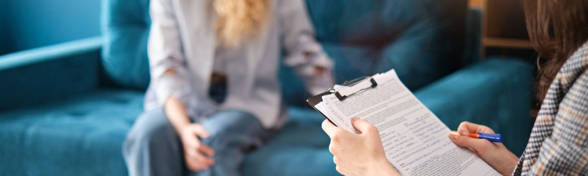 Treatment of Alcoholism Pathfinders Recovery Center - An individual is meeting with an addiction counselor to determine the right plan for their treatment of alcoholism.